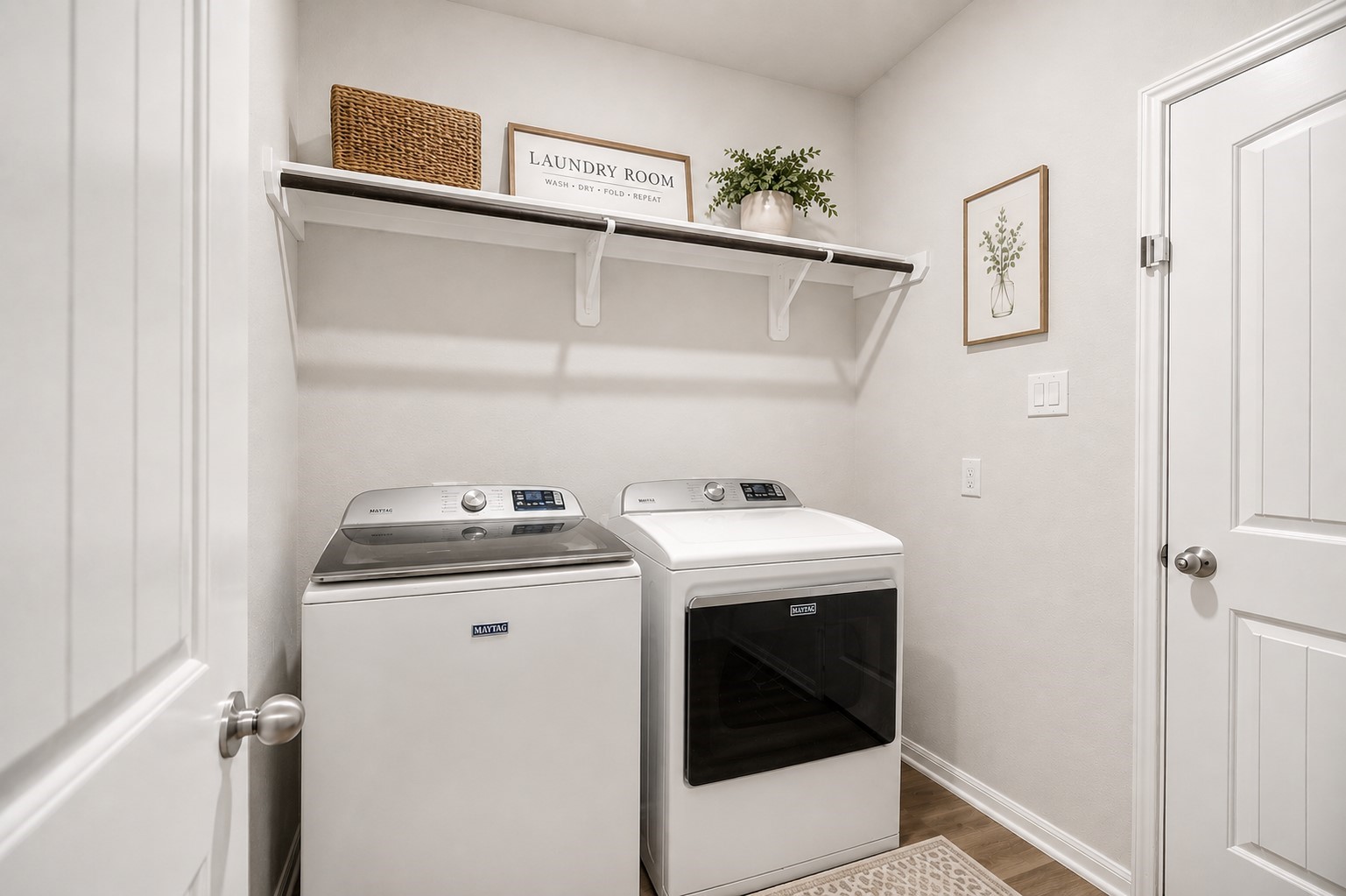 13432 Maverick Trail Road Conroe, TX 77303 - Photo 22 of 50 Bright and efficient laundry room featuring modern appliances, open shelving for storage. (washer/dryer can stay if you prefer.)