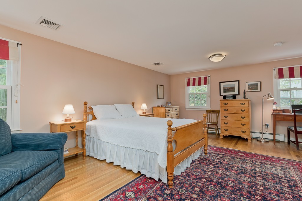 73 Audubon Road Wellesley, MA 02481 - Photo 20 of 24 a bed room with bed and window