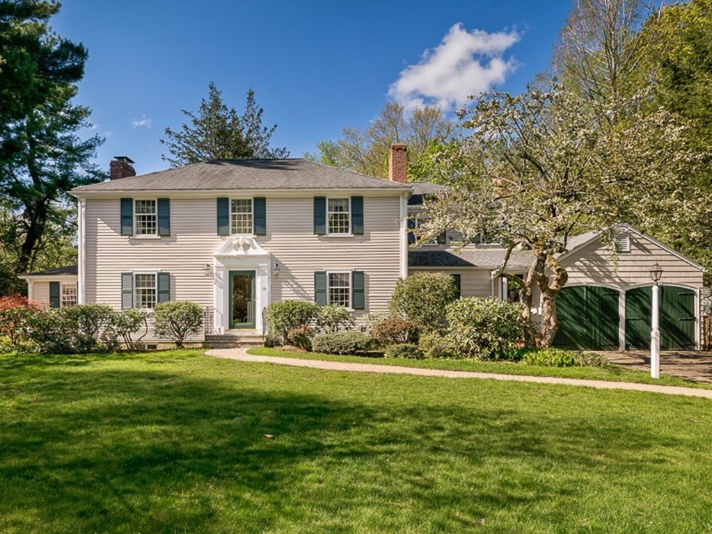 73 Audubon Road Wellesley, MA 02481 - Photo 2 of 24 a front view of a house with a yard