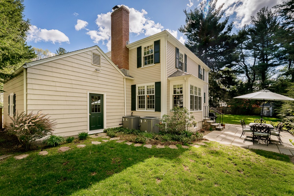 73 Audubon Road Wellesley, MA 02481 - Photo 23 of 24 a view of a house with backyard