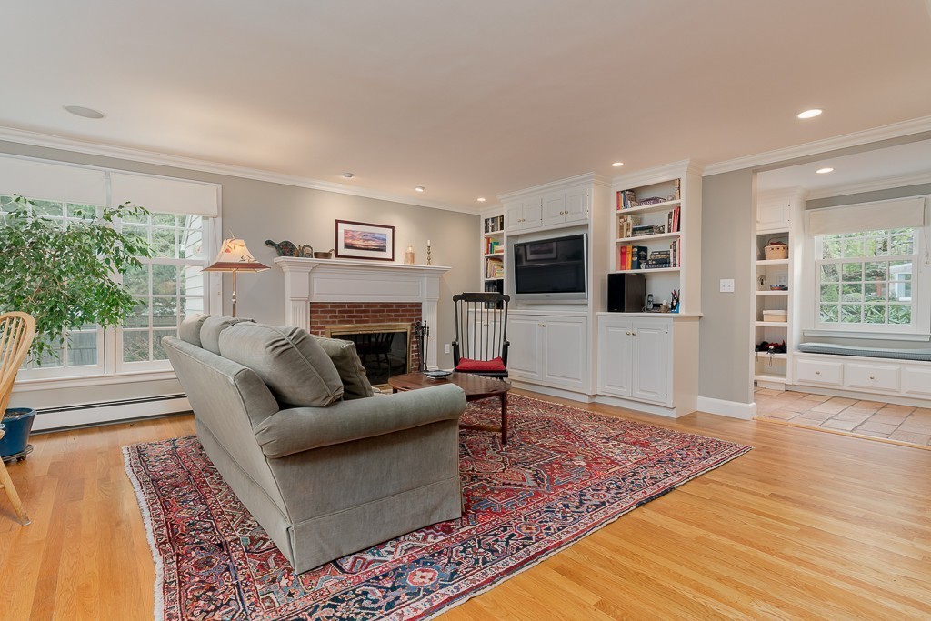 73 Audubon Road Wellesley, MA 02481 - Photo 5 of 24 a living room with furniture and a flat screen tv