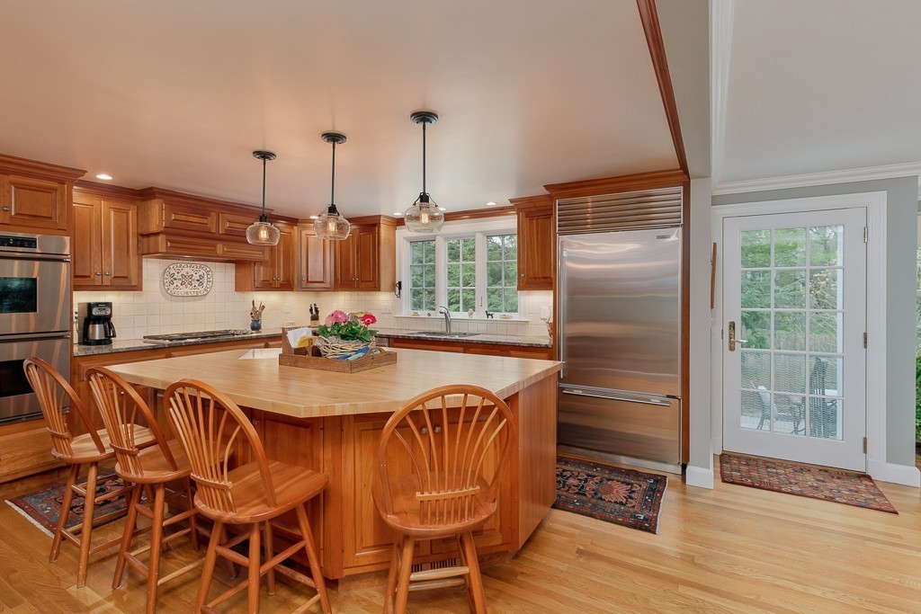 73 Audubon Road Wellesley, MA 02481 - Photo 8 of 24 a dining room with furniture and wooden floor
