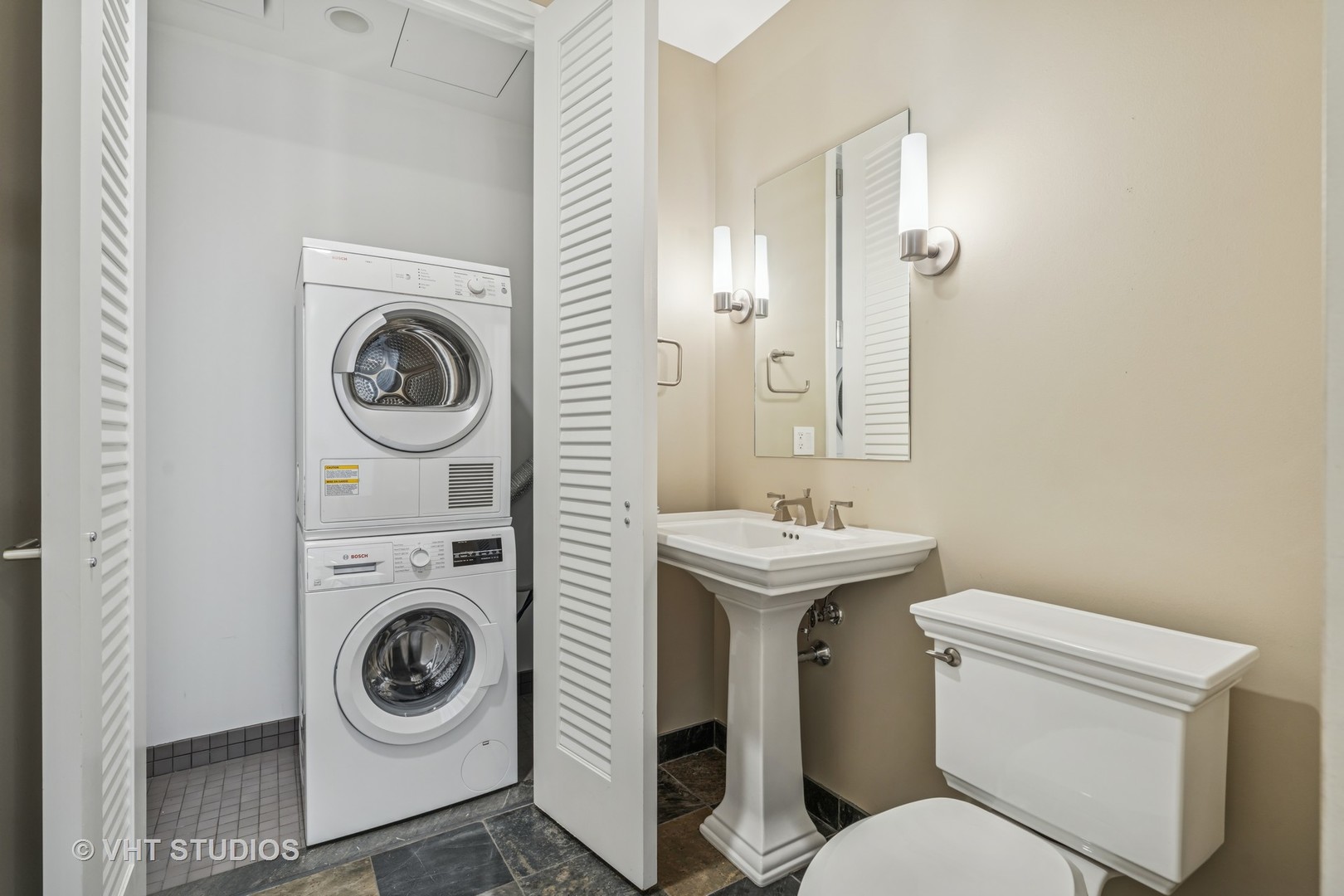 401 North Wabash Avenue, Unit 83E Chicago, IL 60611 - Photo 11 of 33 a bathroom with a sink and a toilet