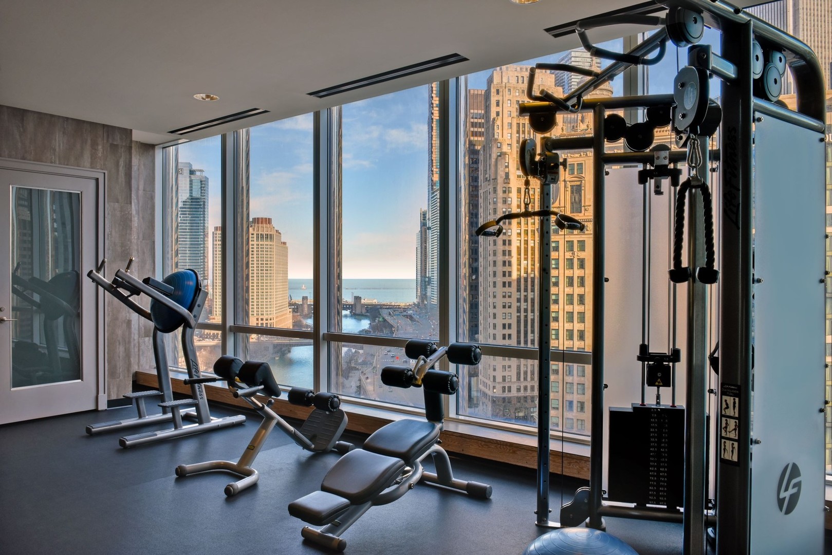 401 North Wabash Avenue, Unit 83E Chicago, IL 60611 - Photo 26 of 33 a view of a room with gym equipment