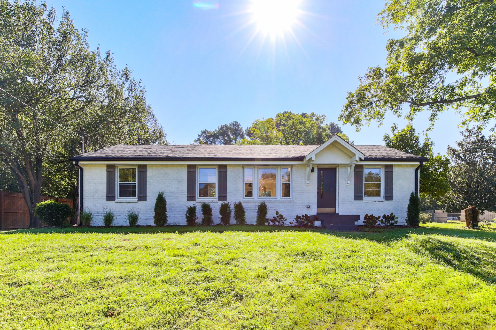 3826 East Ridge Drive Nashville, TN 37211 - Photo 1 of 10 a view of a house with a backyard and a patio