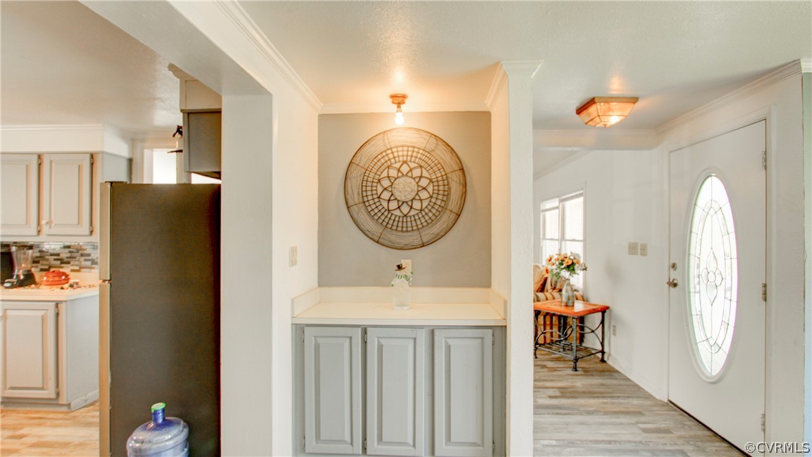 1694 Rolling Acres Road Emporia, VA 23847 - Photo 14 of 45 Foyer with light hardwood / wood-style floors and