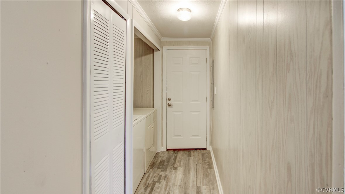 1694 Rolling Acres Road Emporia, VA 23847 - Photo 15 of 45 Hall with independent washer and dryer, light hard