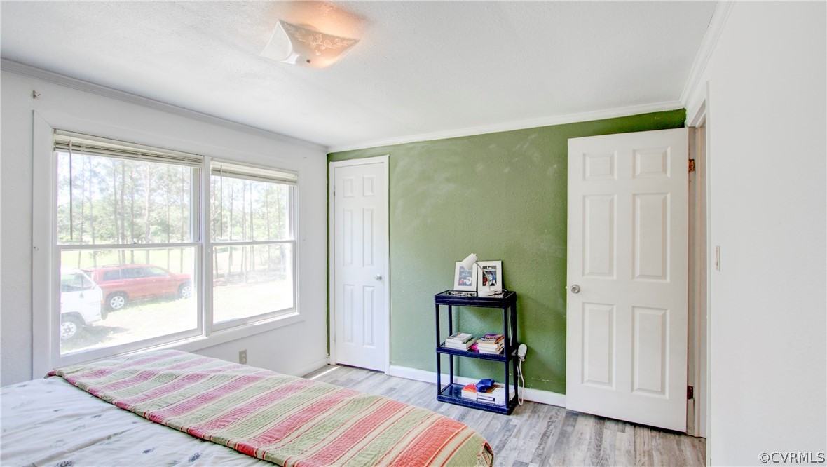 1694 Rolling Acres Road Emporia, VA 23847 - Photo 27 of 45 Bedroom featuring light hardwood / wood-style floo