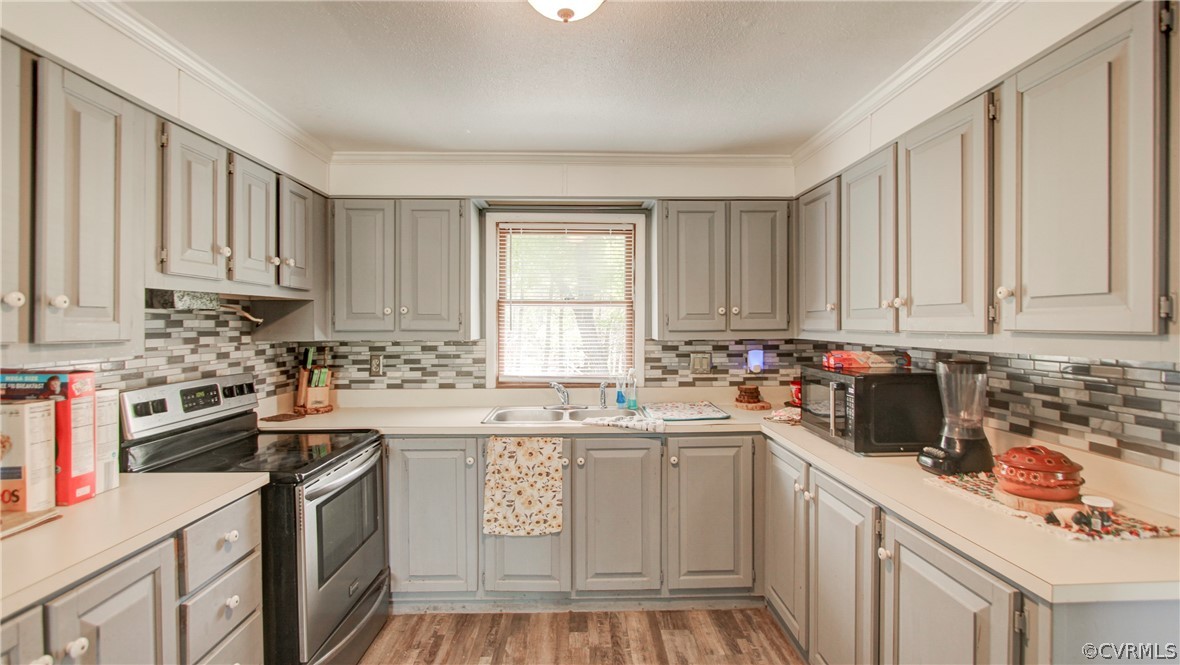 Kitchen featuring light hardwood / wood-style floo