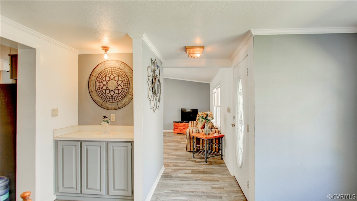 1694 Rolling Acres Road Emporia, VA 23847 - Photo 10 of 45 Corridor featuring light hardwood / wood-style flo