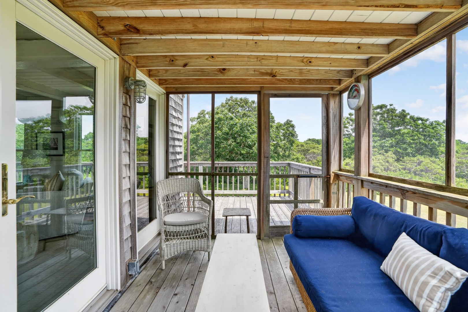 28 Black Point Road Chilmark, MA 02535 - Photo 12 of 56 Wrap-around deck leads to the screened porch.