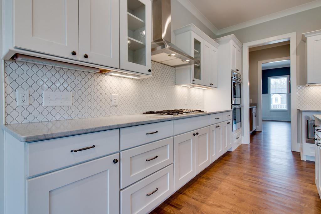 313 Circuit Road Franklin, TN 37064 - Photo 14 of 29 Antiqued glass cabinet doors