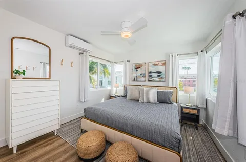 a view of a patio with table and chairs and potted plants