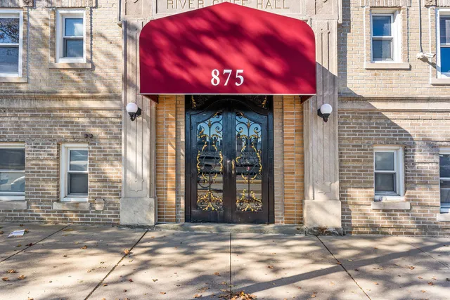 a view of a brick building with a door