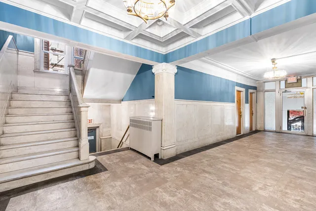 a view of a hallway with closet