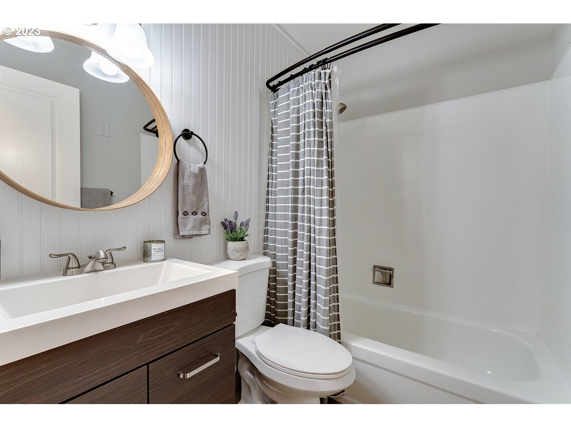 200 Southwest Florence Avenue, Unit C9 Gresham, OR 97080 - Photo 18 of 32 a bathroom with a sink and a mirror