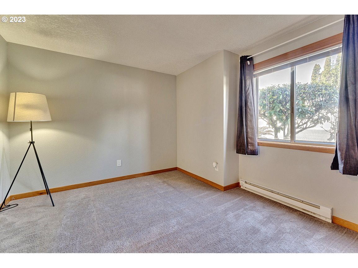 200 Southwest Florence Avenue, Unit C9 Gresham, OR 97080 - Photo 19 of 32 a view of an empty room with a window