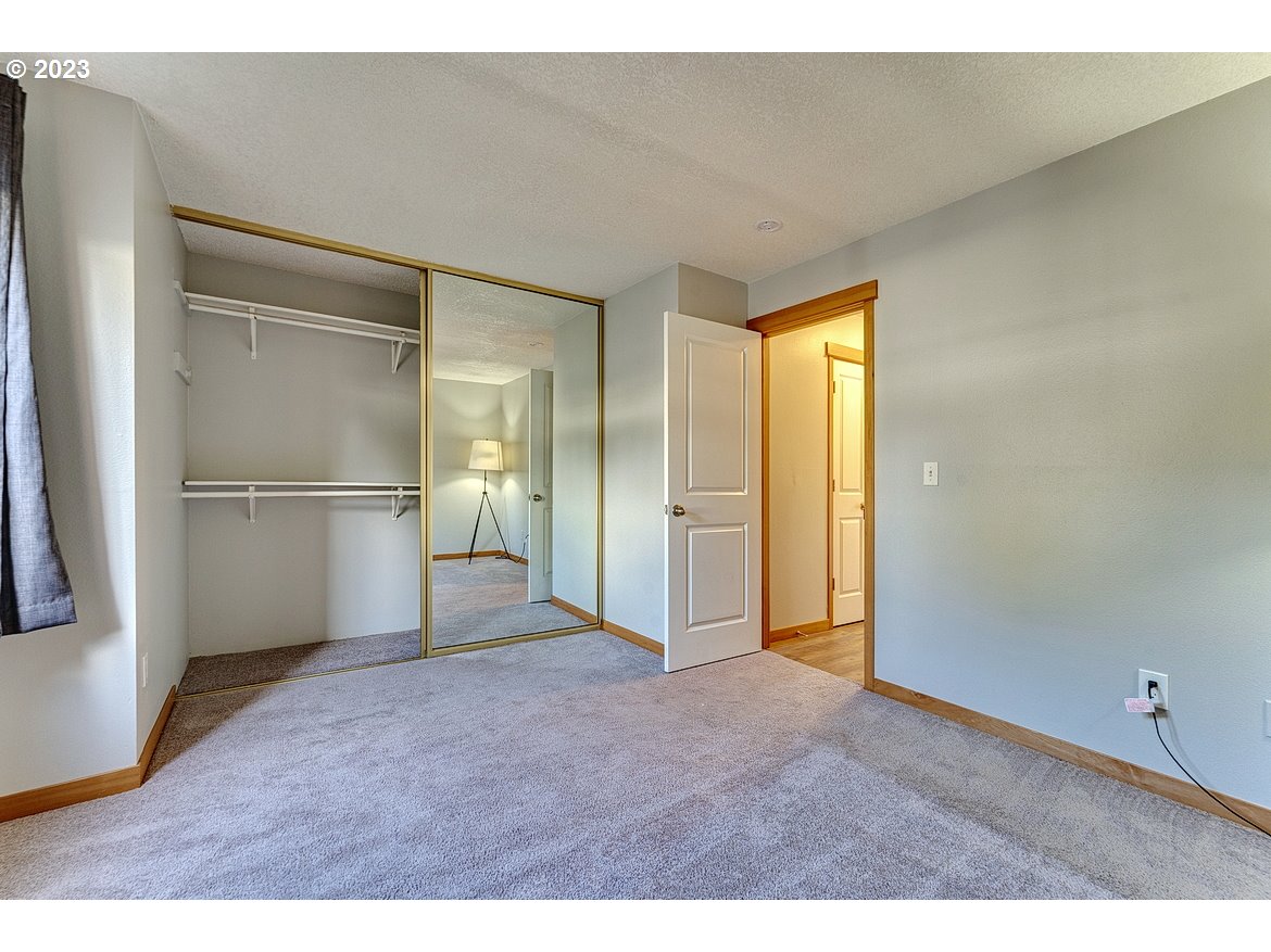 200 Southwest Florence Avenue, Unit C9 Gresham, OR 97080 - Photo 22 of 32 a view of empty room with wooden floor