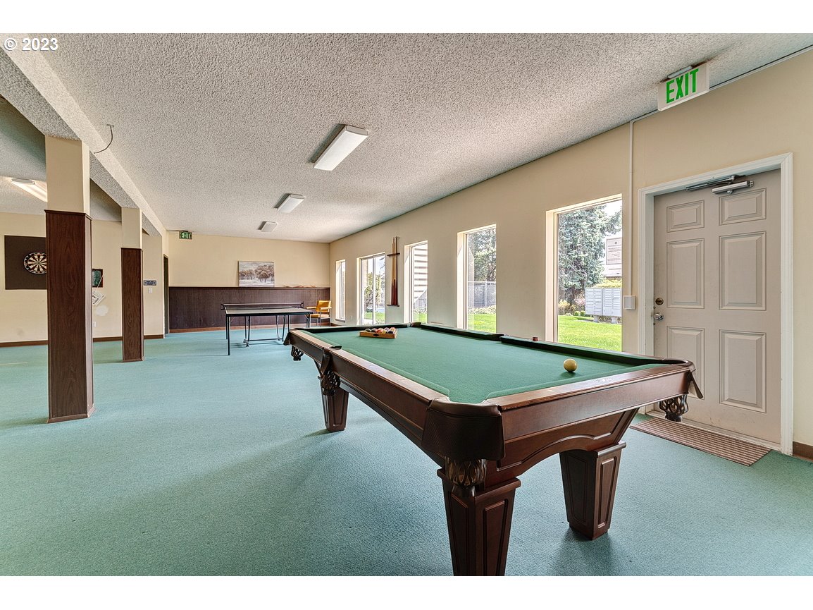 200 Southwest Florence Avenue, Unit C9 Gresham, OR 97080 - Photo 30 of 32 a room with pool table and windows