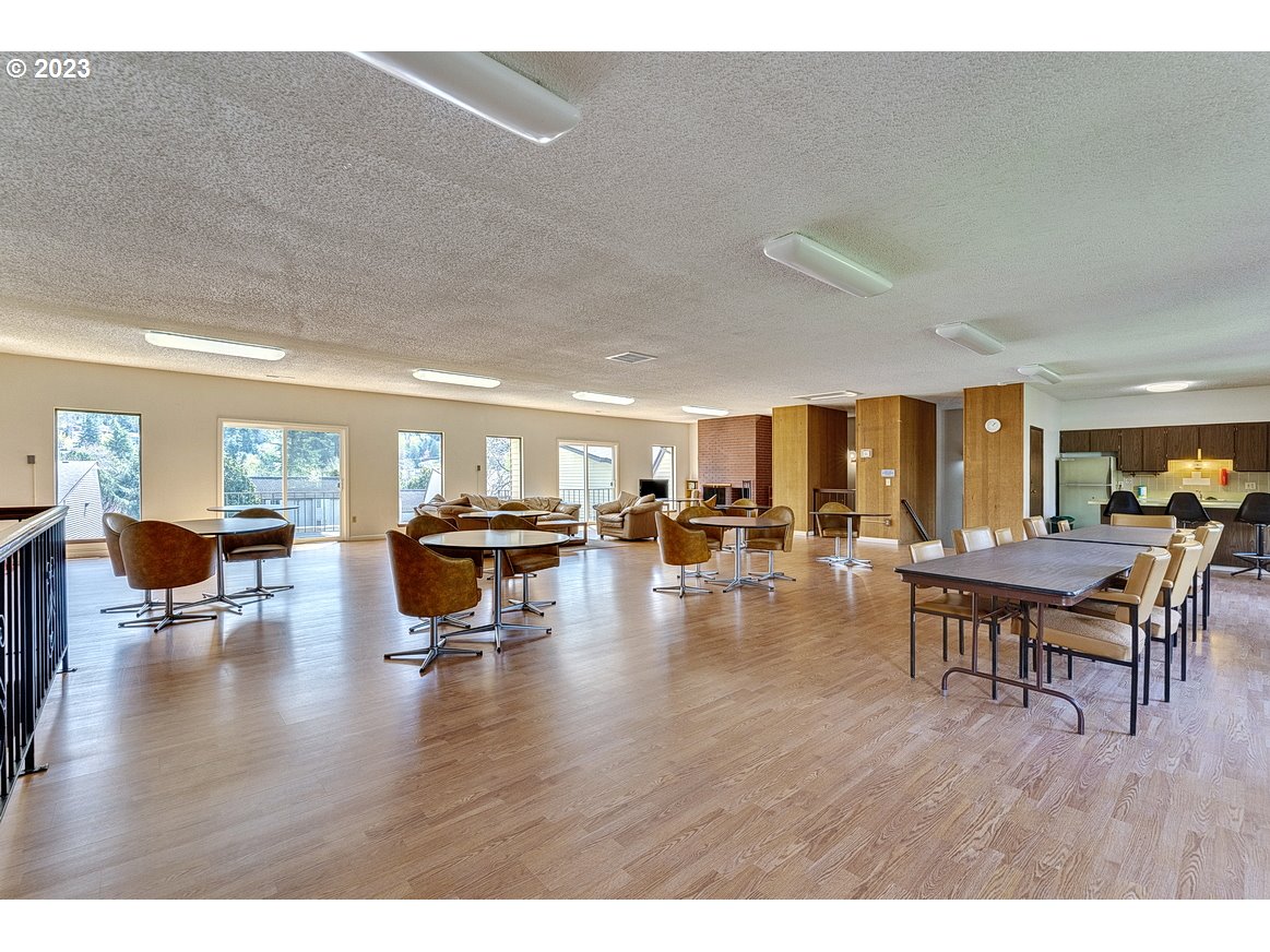 200 Southwest Florence Avenue, Unit C9 Gresham, OR 97080 - Photo 32 of 32 a living room with furniture and wooden floor