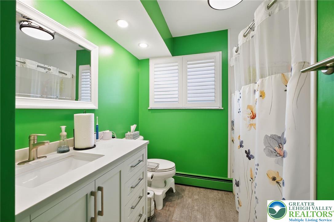 3541 Lumar Street Orefield, PA 18069 - Photo 15 of 30 a bathroom with a sink a toilet and a shower