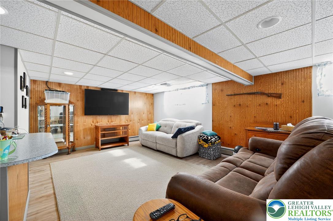 3541 Lumar Street Orefield, PA 18069 - Photo 22 of 30 a living room with furniture and a flat screen tv