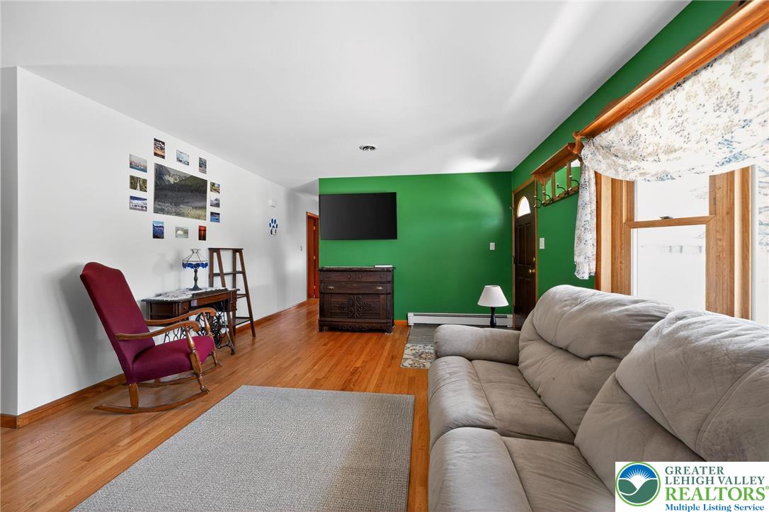 3541 Lumar Street Orefield, PA 18069 - Photo 9 of 30 a living room with furniture and a flat screen tv
