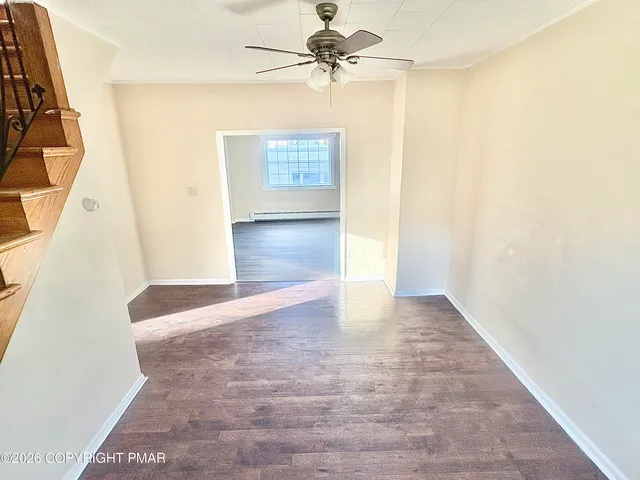 a stove top oven sitting inside of a kitchen