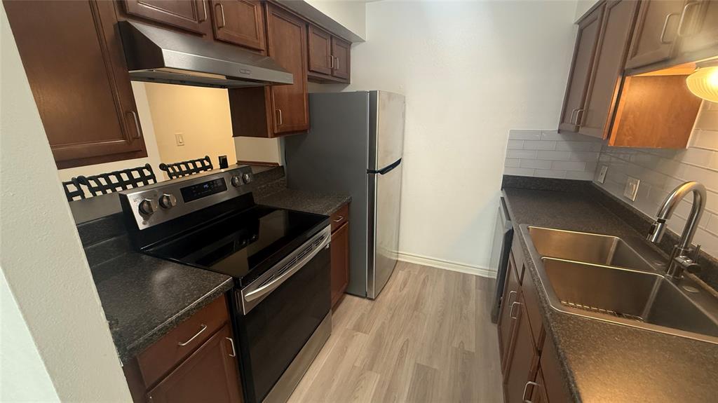 500 East Riverside Drive, Unit 132 Austin, TX 78704 - Photo 3 of 31 a close view of appliances and cabinets