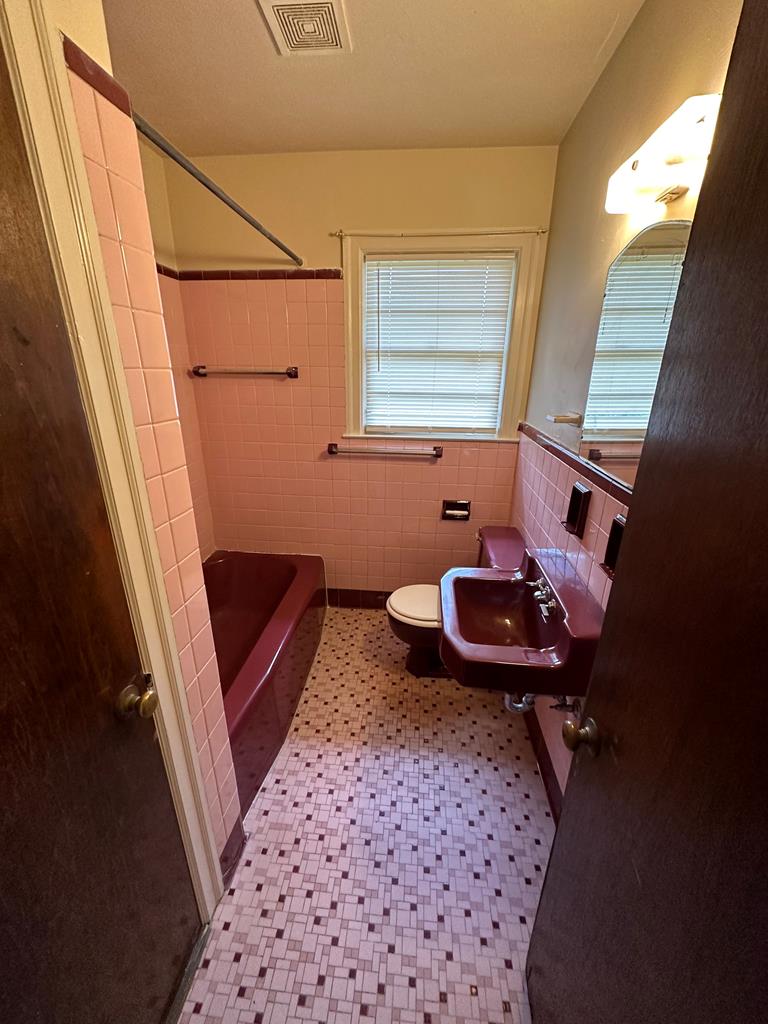 1235 Lockwood Avenue Columbus, GA 31906 - Photo 11 of 11 a room with furniture and a window