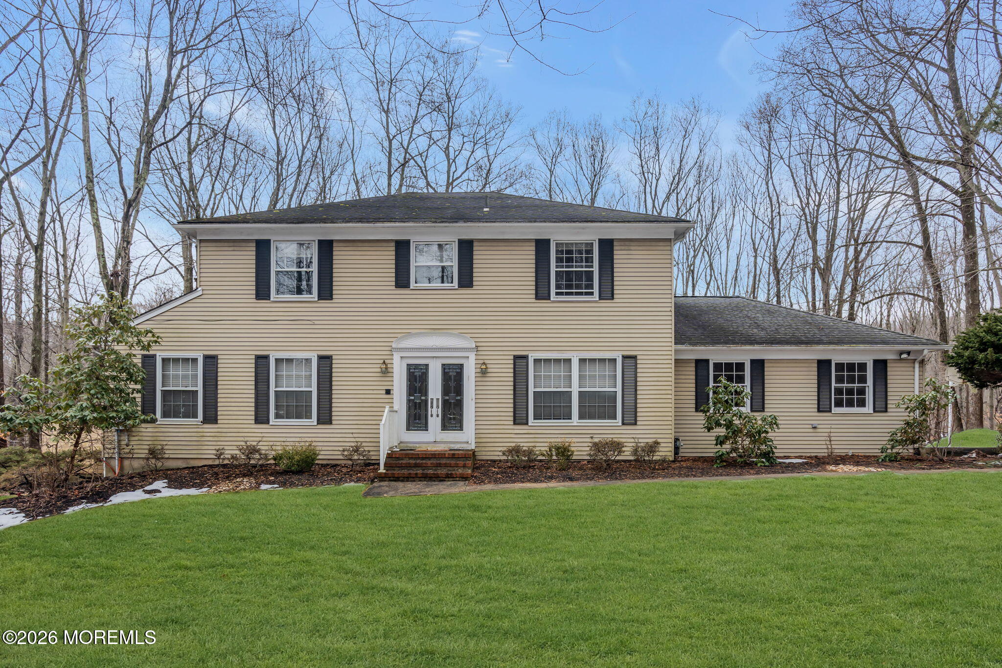 103 Reids Hill Road Morganville, NJ 07751 - Photo 1 of 44 a front view of house with yard