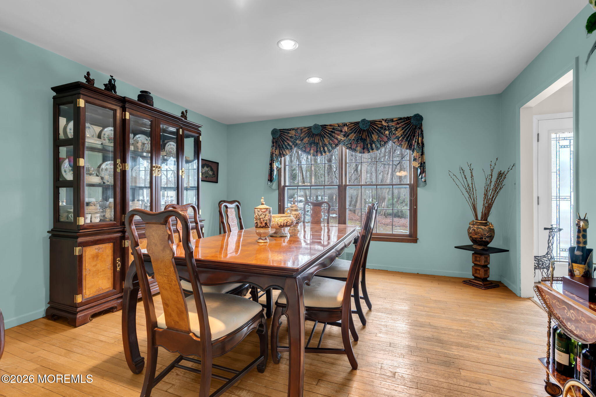 103 Reids Hill Road Morganville, NJ 07751 - Photo 13 of 44 a view of a dining room with furniture and window