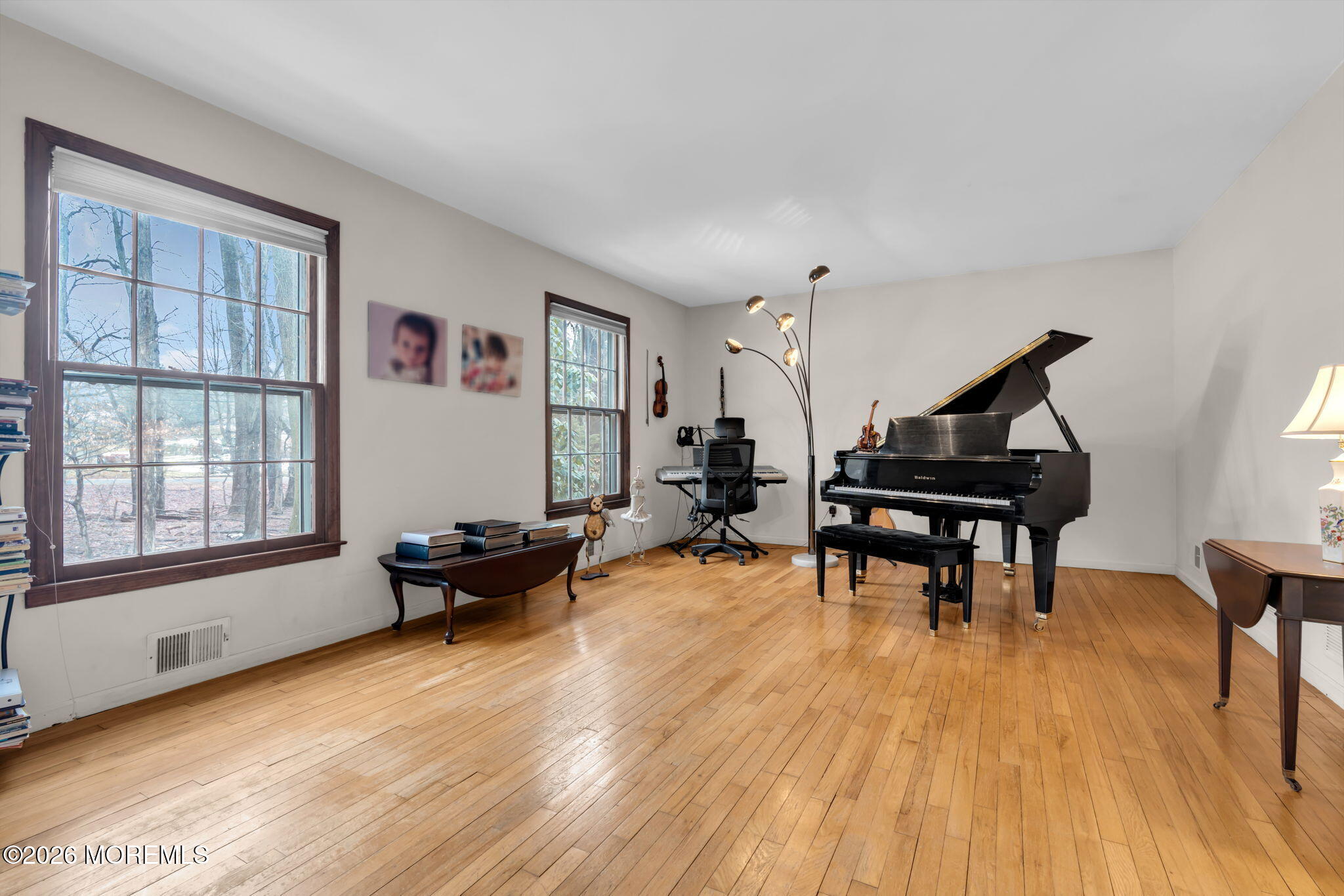 103 Reids Hill Road Morganville, NJ 07751 - Photo 15 of 44 a living room with furniture and a wooden floor
