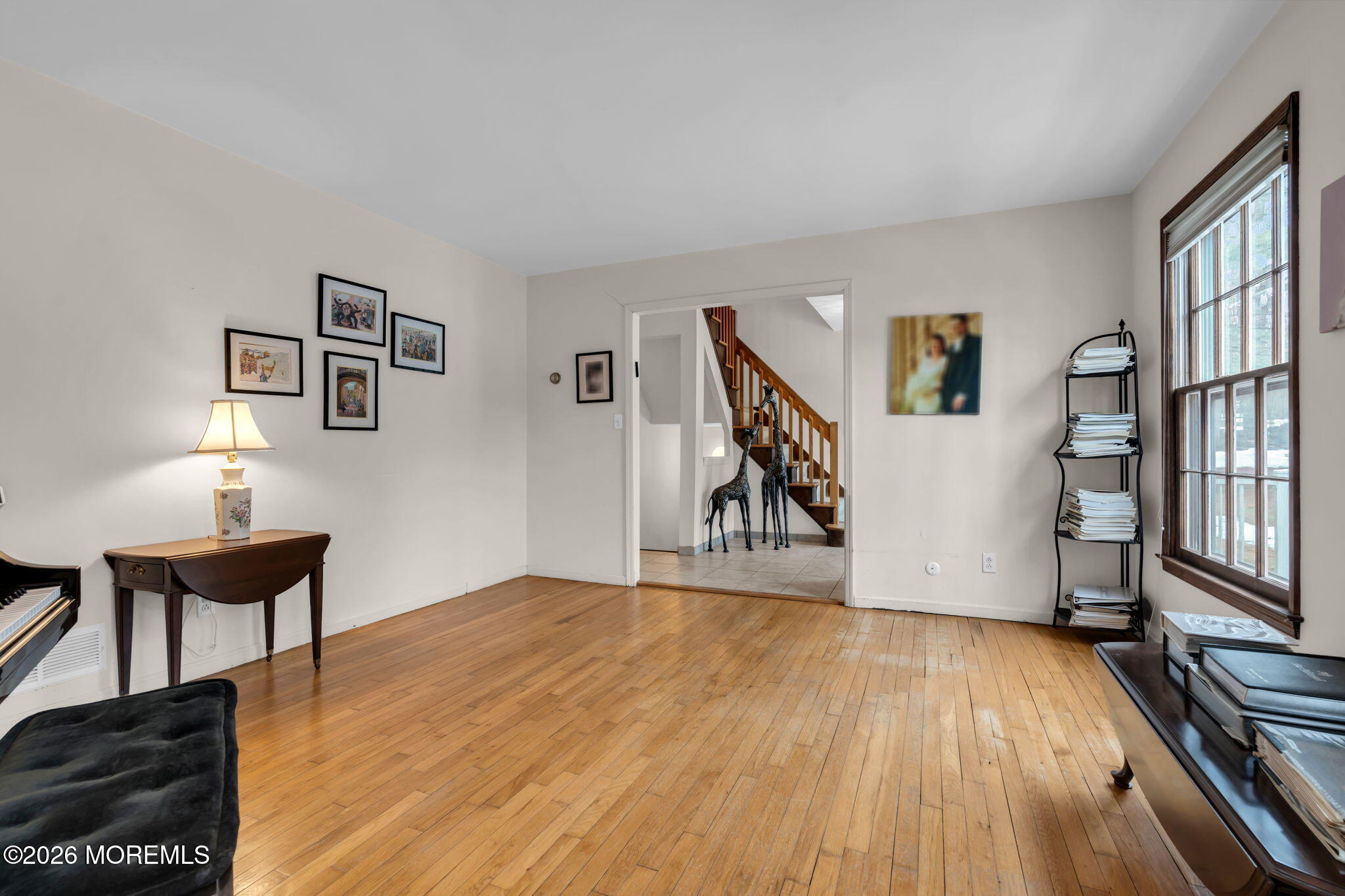103 Reids Hill Road Morganville, NJ 07751 - Photo 16 of 44 a view of a livingroom with furniture and staircase