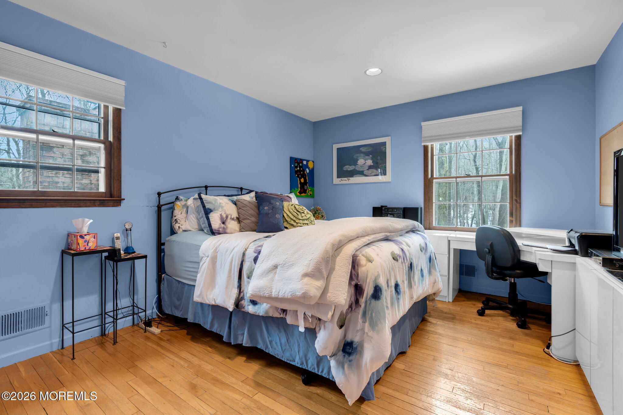 103 Reids Hill Road Morganville, NJ 07751 - Photo 31 of 44 a bed sitting in a bedroom next to a window