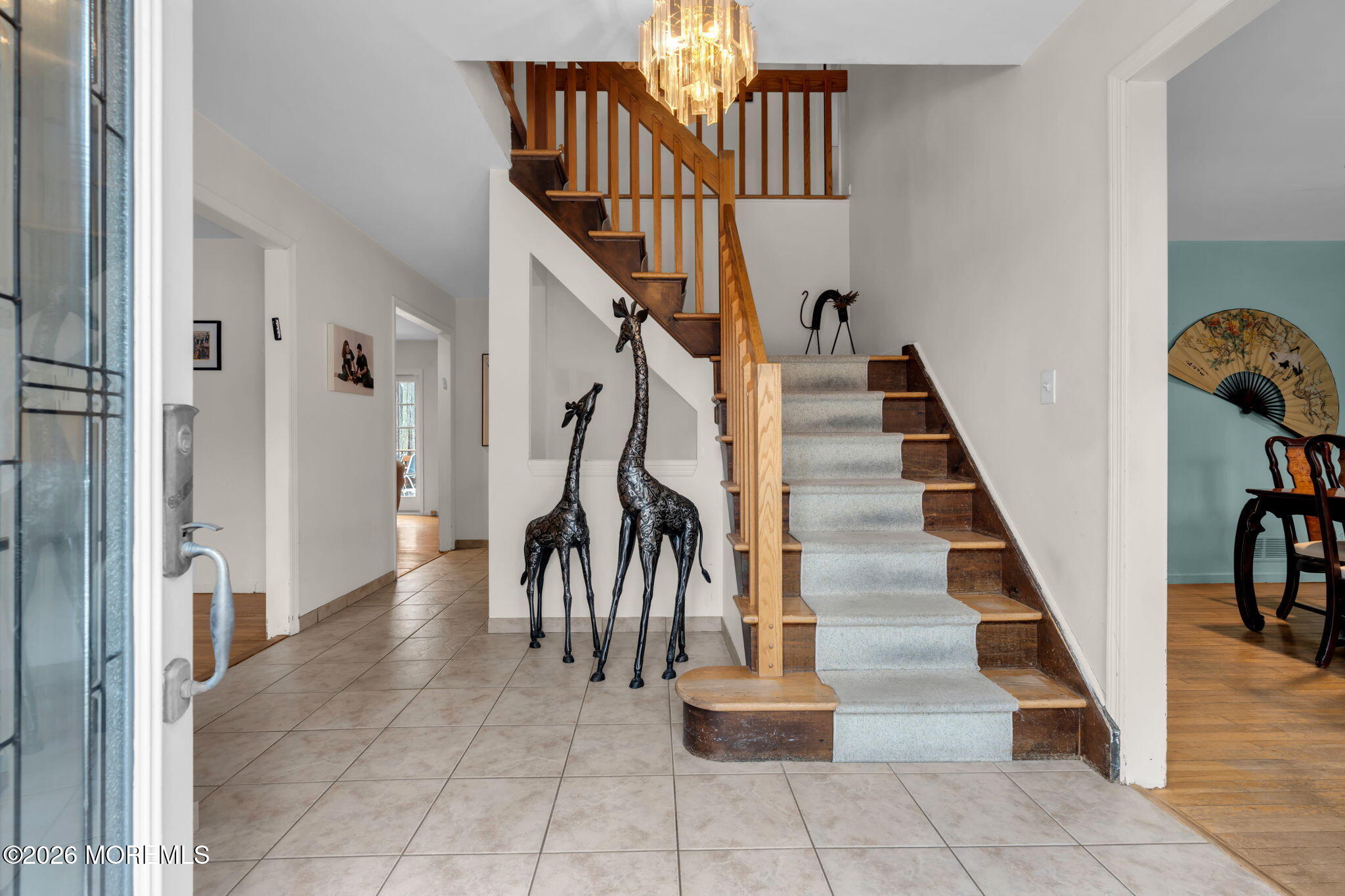 103 Reids Hill Road Morganville, NJ 07751 - Photo 7 of 44 a view of entryway and hall with a workspace