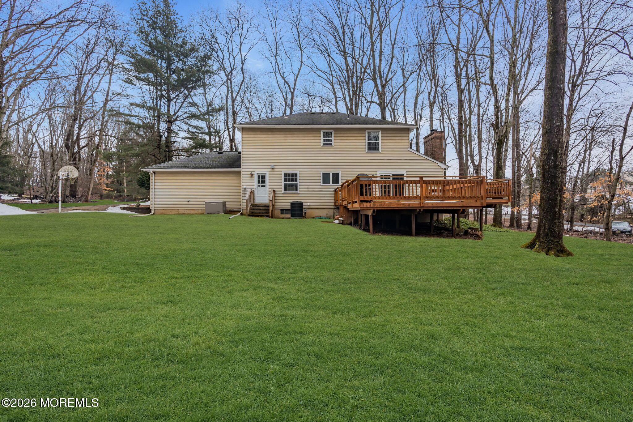 103 Reids Hill Road Morganville, NJ 07751 - Photo 9 of 44 a view of a house with a backyard
