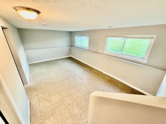 906 Blackhawk Drive University Park, IL 60484 - Photo 11 of 13 a view of an empty room with a window