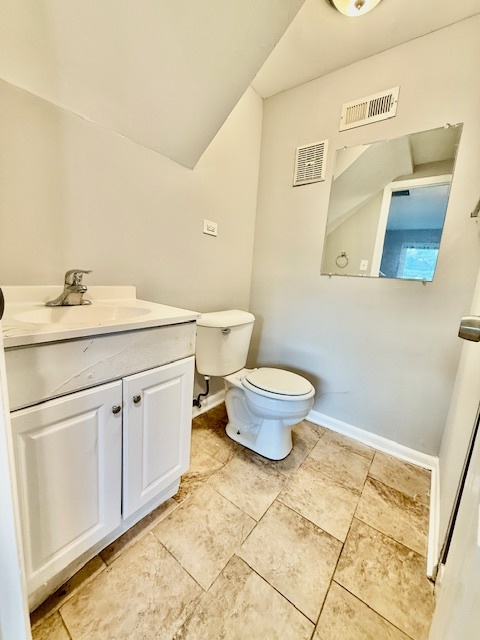 906 Blackhawk Drive University Park, IL 60484 - Photo 8 of 13 a bathroom with a granite countertop toilet and sink