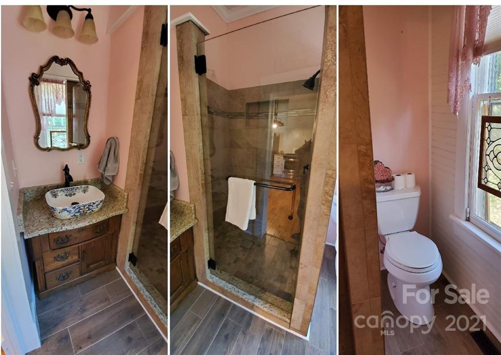 2251 Boheler Road Clover, SC 29710 - Photo 11 of 29 a bathroom with a toilet and a shower curtain