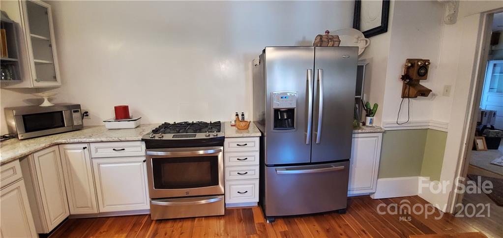 2251 Boheler Road Clover, SC 29710 - Photo 4 of 29 a kitchen with stainless steel appliances granite countertop a refrigerator and a stove