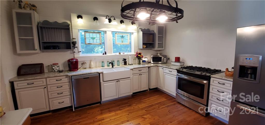 2251 Boheler Road Clover, SC 29710 - Photo 5 of 29 a kitchen with a sink stainless steel appliances and cabinets