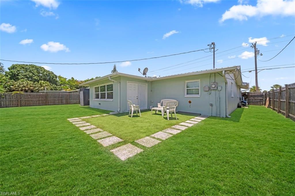 5460 Bayshore Road North Fort Myers, FL 33917 - Photo 14 of 14 a house view with a garden space