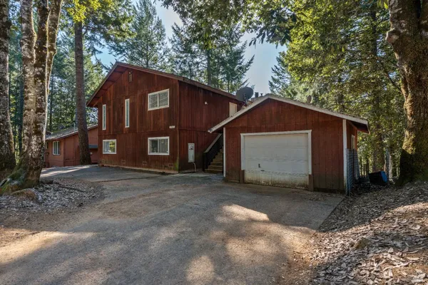 a house with trees in front of it