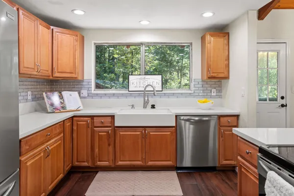 a kitchen with a sink and cabinets