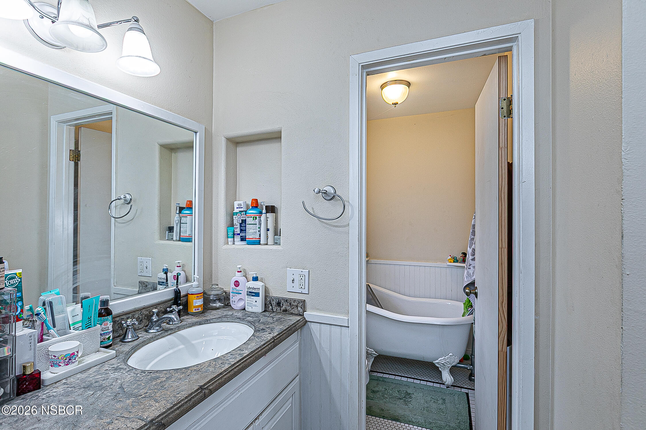 712 Pebble Beach Place Santa Maria, CA 93454 - Photo 25 of 31 a bathroom with a granite countertop sink toilet and shower