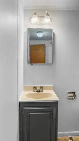 a sink with a mirror
