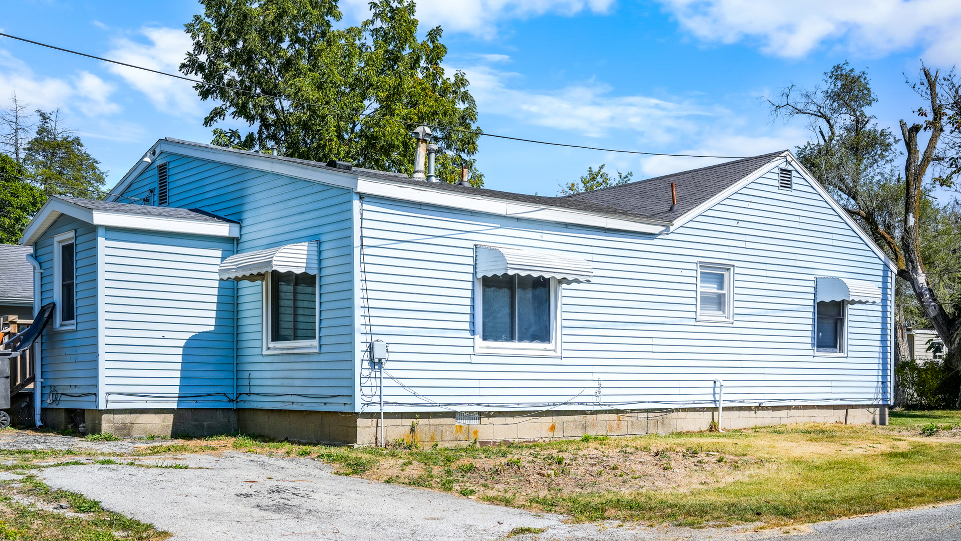 913 Forrest Street Danville, IL 61832 - Photo 27 of 29 a view of a house with a backyard