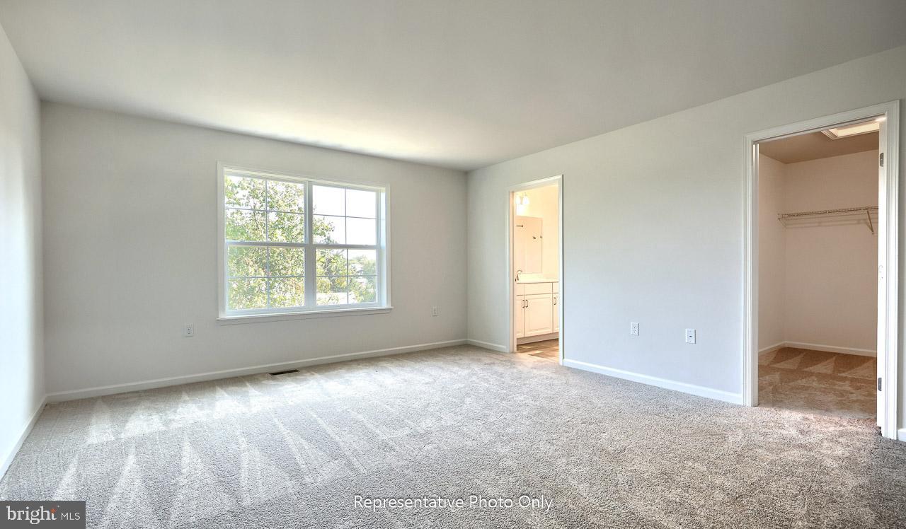 7855 Oakbrook Drive Harrisburg, PA 17112 - Photo 22 of 22 an empty room with windows and closet