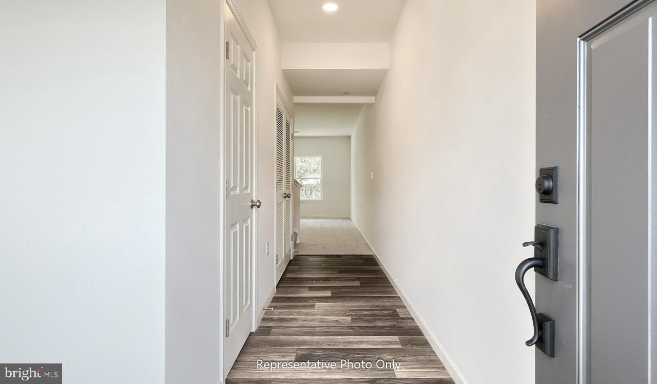 7855 Oakbrook Drive Harrisburg, PA 17112 - Photo 4 of 22 a view of a hallway with a white walls